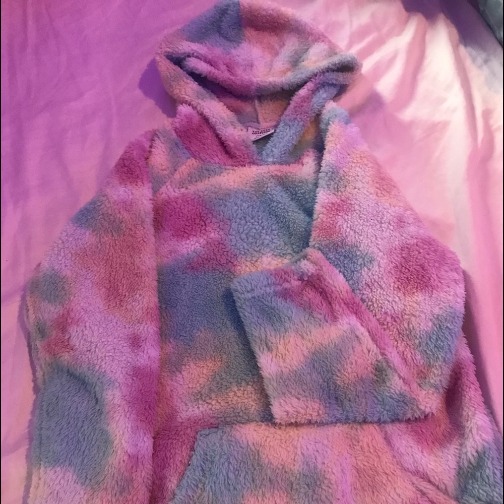 A fluffy,colorful,and cozy sweatshirt.Size small.Made by Rue 21